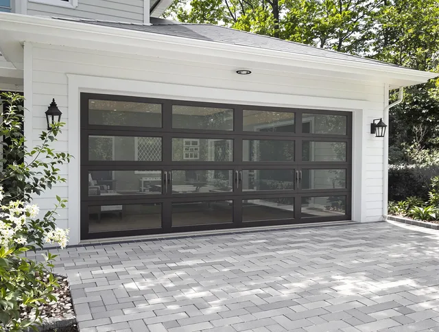 Sharon Garage Door Repair design specialist presenting custom garage door options to Sharon homeowner